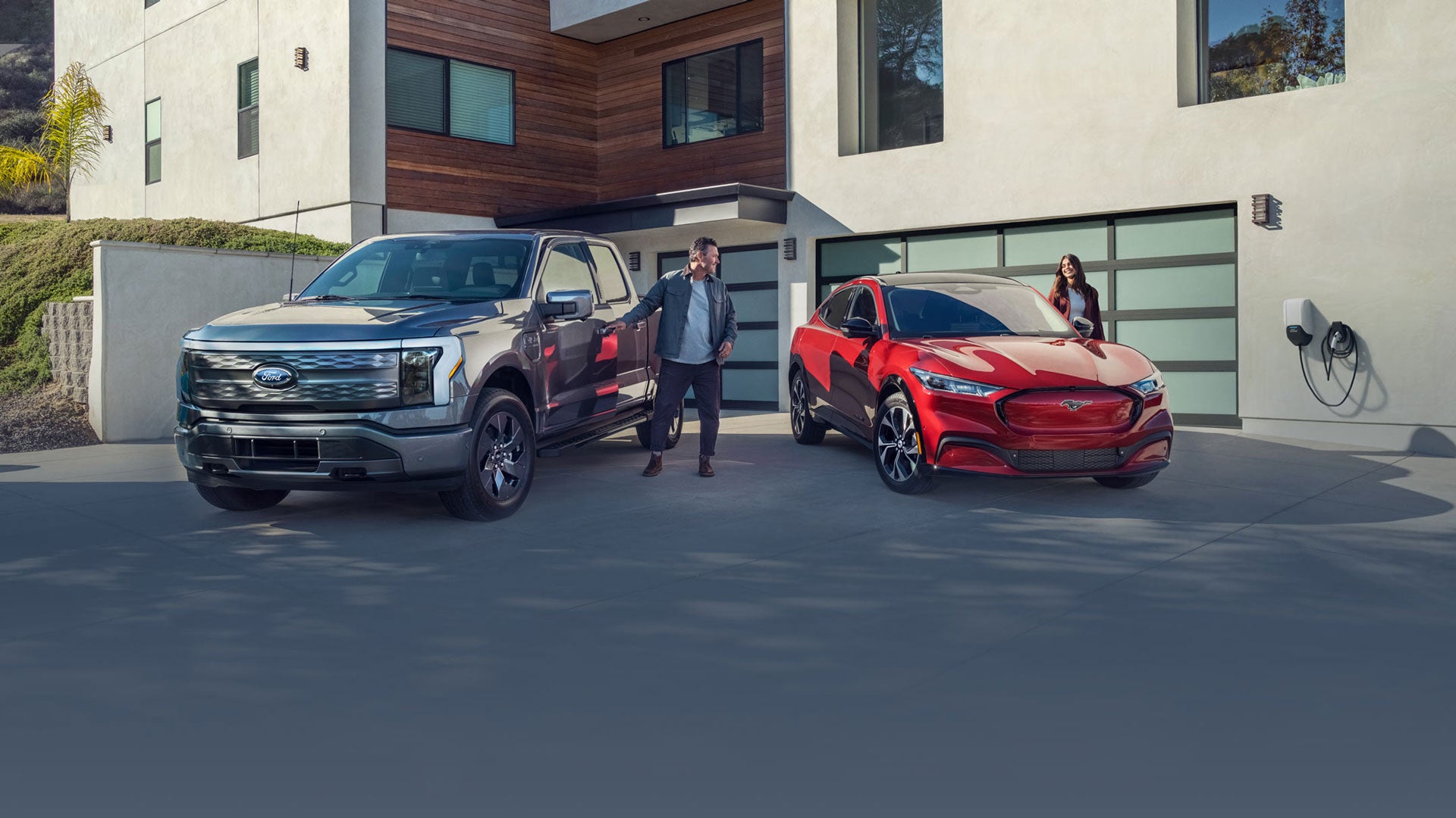 Ford Mustang and Folrd Lighting parked in a a driveway