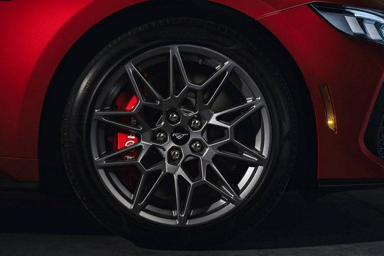 2024 Ford Mustang® model with a close-up of a wheel and brake caliper | Way Scarff Ford Auburn in Auburn WA